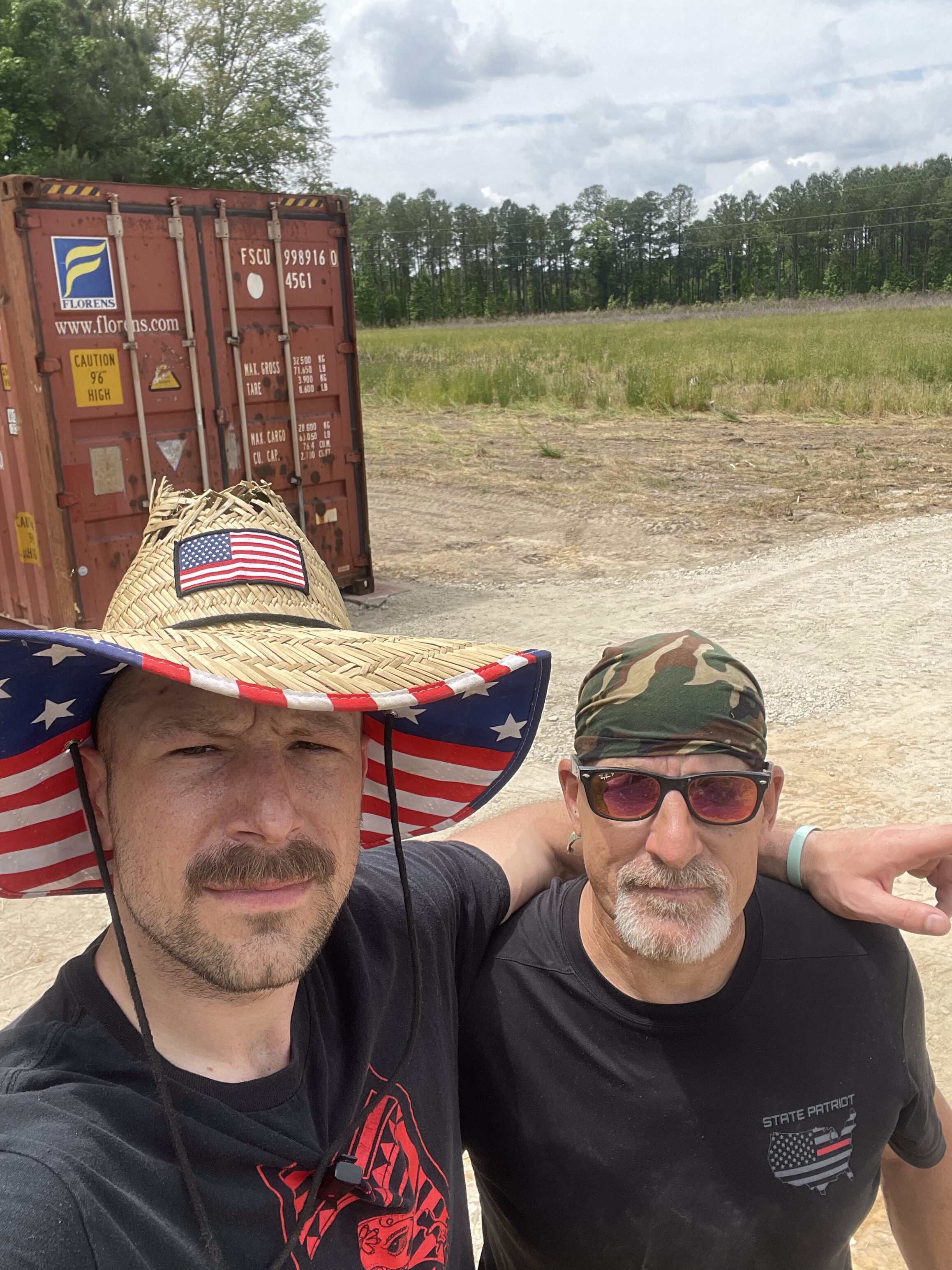Kyle and his father on the farm